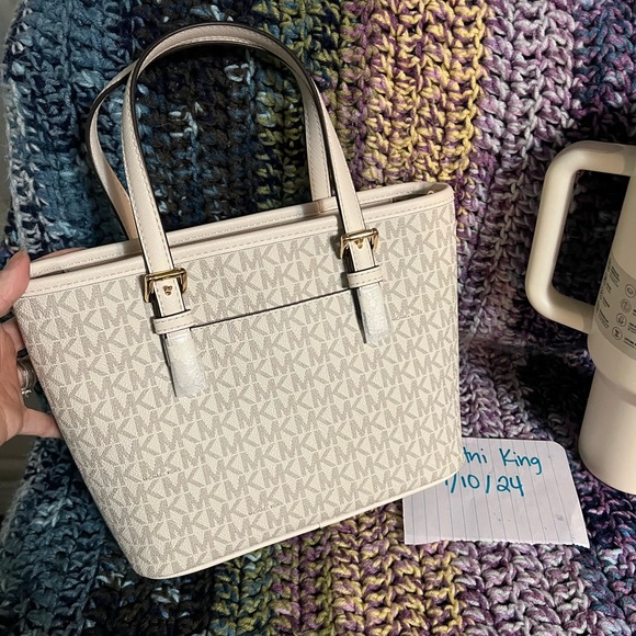 Both new with tags!! Small zip top Michael Kors purse and Cream 40oz Stanley. - Picture 4 of 5